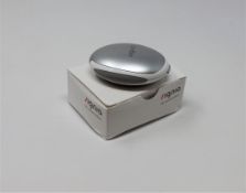 A boxed as new Signia 7NX Pure Charge & Go Hearing Aid (REF: 10950915).