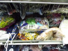 A large quantity of tunics with colourful floral decorations.