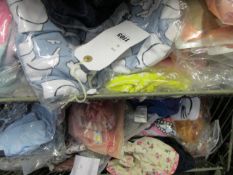 A quantity of children's clothing and related items to include: mattress toppers and dressing gown