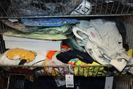 A large quantity of children's clothing and related items to include t-shirts, romper suits and