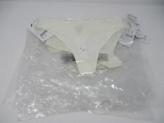 Seven women's as new Chantelle Natural Soft Stretch One Size Seamless ivory thong.