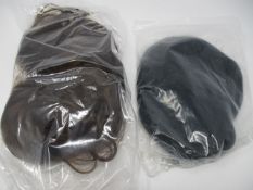 A quantity of wig extensions and related items.