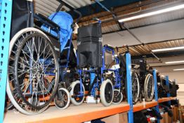 Six pre-owned wheelchairs.
