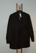 One men's pre-owned Superdry Surplus black jacket size M (Requires washing).