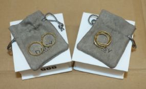 An as new Daisy London Estée Lalonde Trinity Ring (18ct gold plate - marked 925 XL) together with