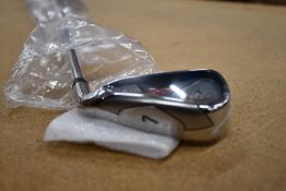 One as new Callaway X Hot 7 iron (Right handed).