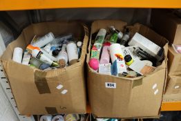 Two boxes of miscellaneous part used cosmetics, toiletries and related items.