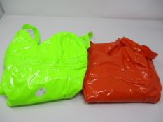 A large quantity of neon orange and green PVC mini dresses.