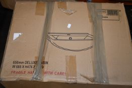 One boxed Deluxe basin white (Model: NBC103).