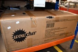 One boxed as new four piece outdoor rattan furniture set.