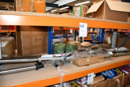 A quantity of as new weightlifting poles.