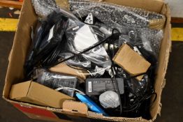 A box of assorted new and pre-owned small electrical items and accessories.