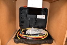 One pre-owned Testo 570 refrigeration manifold kit.