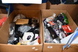 Two boxes of assorted as new and pre-owned small electrical items and accessories.