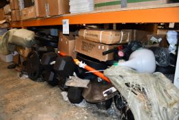 A large quantity of assorted gym weights and related items.