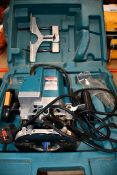 A pre-owned Makita 3612c router.