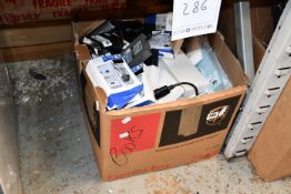 A box of assorted as new and pre-owned small electrical items and accessories.