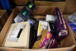 A box of miscellaneous items to include umbrellas, bottle openers and lava lamps.