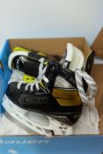 An as new pair of Bauer Supreme 3S Jr. Hockey Skates size 1.0.