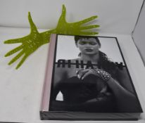 One boxed as new limited edition The Rihanna Book by Phaidon, with an original tattooed hand