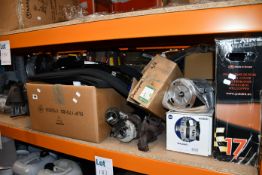 One shelf of miscellaneous car parts and related items to include tow bars and ZF Lifeguard Fluid