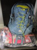 One pre-owned North Face Borealis backpack (Diesel blue/acid yellow. Require washing). One as new