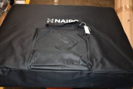A Naipo three fold portable massage table with aluminium feet.