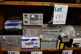 A large quantity of miscellaneous batteries and related items.