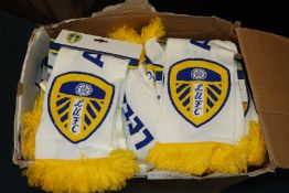 A large box of Leeds FC scarfs.