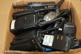 A quantity of pre-owned miscellaneous portable two-way radios and related items to include