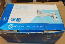 A pair of as new Tesi 2 - hole bath filler rim mounted chrome taps (Box unsealed and damaged).