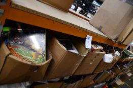 Four boxes of miscellaneous items to include one Pokemon Battle Academy card game, one Lloytron