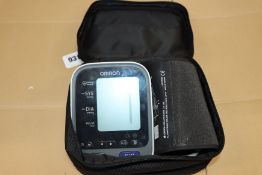 A pre-owned Omron M7 blood pressure monitor with carry case.