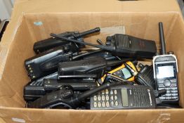 A quantity of pre-owned miscellaneous portable two-way radios and related items to include
