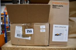 Four boxed as new Fiskars replacement cutting heads for UPX82/UPX86.