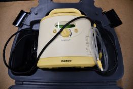 One boxed Medela Symphony hospital grade double electric breast pump.