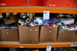 Five boxes of miscellaneous items to include toys greeting cards and fishing accessories.