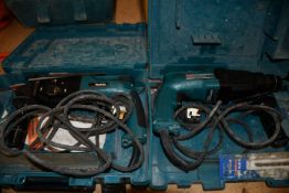Two pre-owned Makita HR2020 hammer drills.