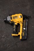 One pre-owned Dewalt cordless brushless nail gun (18 volt).