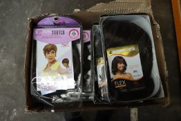 A quantity of as new Motown Stress and Vivica Fox synthetic wigs in various styles (8 items).