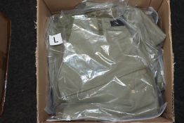 One large quantity of Bsapa Studio olive green skirts.