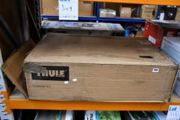 One boxed Thule Coaster XT bicycle trailer in blue.