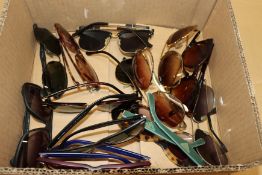 Eleven pairs of sunglasses.