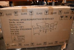One boxed four piece iron and rattan KD sofa set.