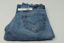 One women's as new EB Denim Bandless jeans size 27.