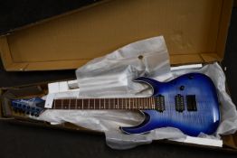 One pre-owned Ibanez RG Series electric guitar in Blue Lagoon Burst RGA42FM (Some scratches at the
