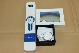 An as new Daniel Wellington watch (Classic B36SW37 - no strap), a child's as new Flik Flak watch and