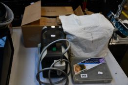 A commercial Ecleris Minivac Crystal-Free diamond tip microdermabrasion machine with accessories.