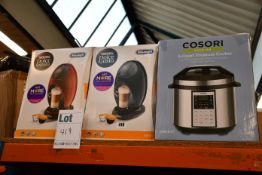 Two DeLonghi Nescafe Dolce Gusto machines and one Cosori Premium 6-quart pressure cooker, all