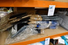 A quantity of spades, shovels and related items.